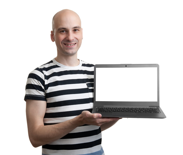 confident young man advertising laptop - Фото, изображение