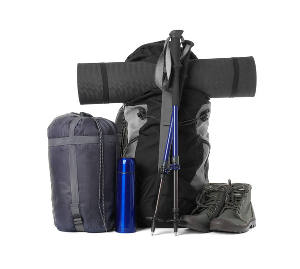 Pair of trekking poles and camping equipment for tourism on white background - Photo, Image