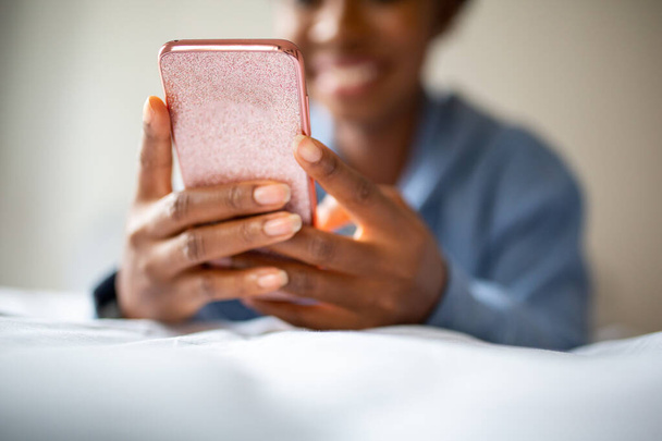 Close up African American woman hands holding cellphone - Photo, Image