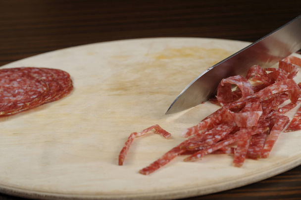 Tasty salami on the table - Φωτογραφία, εικόνα
