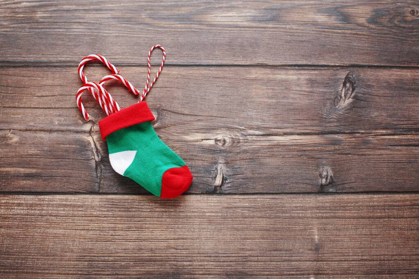 Christmas greeting card template with cute Christmas socks. Flat lay photography.  - Фото, зображення