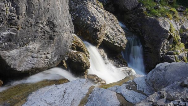 A beautiful shot of a rocky waterfall - Fotó, kép