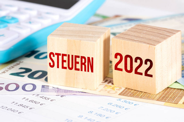 Euro bills, calculators and taxes in 2022 - Photo, Image