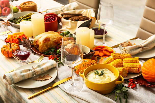 Traditional Thanksgiving food on served table in room - Photo, image