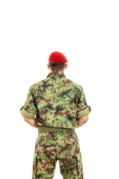 Military army soldier with turned back wearing uniform and cap - Foto, Imagem