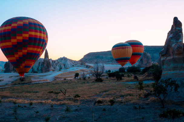 Hot Air Balloons are ready to fly in Cappadocia Turkey. Hot air balloon tourism and activity. Tourism in Cappadocia. Landmarks of Turkey. - Valokuva, kuva