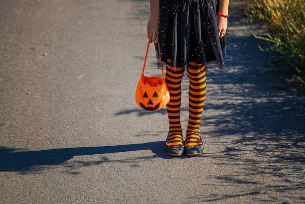 Halloween holiday, child girl in costume. Selective focus. Kid. - Foto, afbeelding