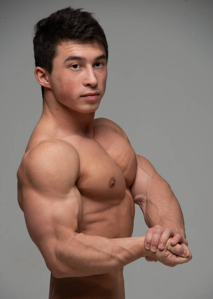 Fitness male model in studio - Foto, Imagen