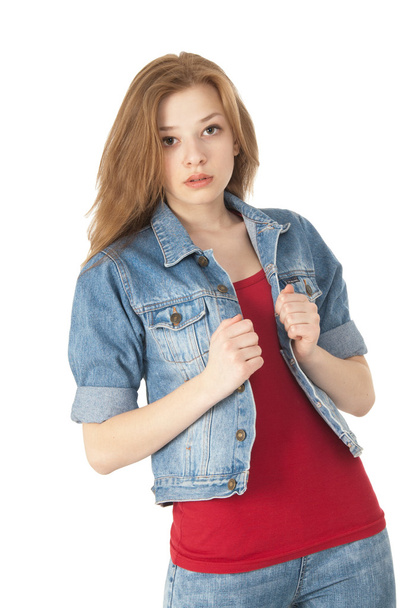 Cute girl in a red T-shirt with jacket on white background - Valokuva, kuva