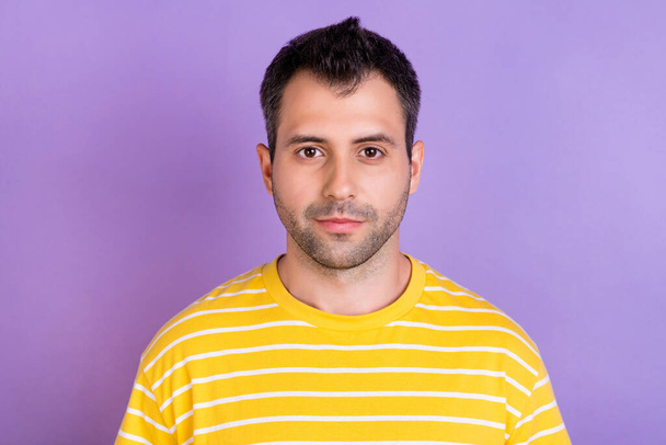 Photo of serious mature man wear striped yellow t-shirt calm face stubble isolated on pastel violet color background - Foto, Bild