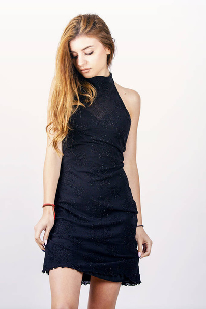 fashion woman white background studio shoot black dress close up - Foto, imagen