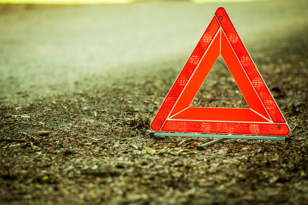 Breakdown of car. Red warning triangle sign on road - Fotoğraf, Görsel