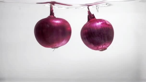 Lilac cibule nakrájená a vařená - Záběry, video