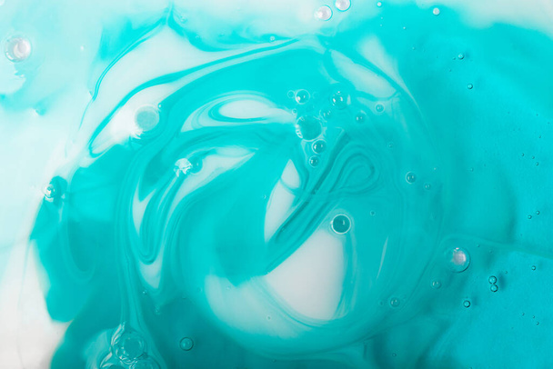 Blue and white liquid shampoo or cosmetics gel.Abstract cosmetic background. - Foto, Imagem