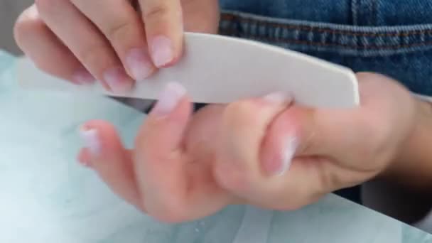 Female hands making manicure. File and shape Nail care, Self care. Do manicure by yourself while stay at home. Diy. Manicure tools - Footage, Video
