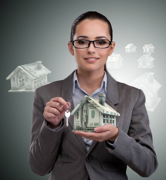 Businesswoman in real estate mortgage concept - Photo, Image