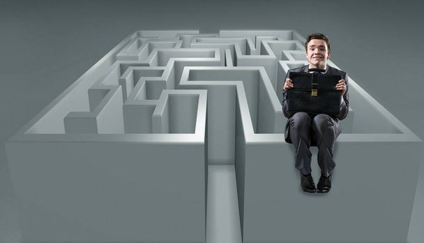 Businessman with maze in difficult situations concept - Photo, Image