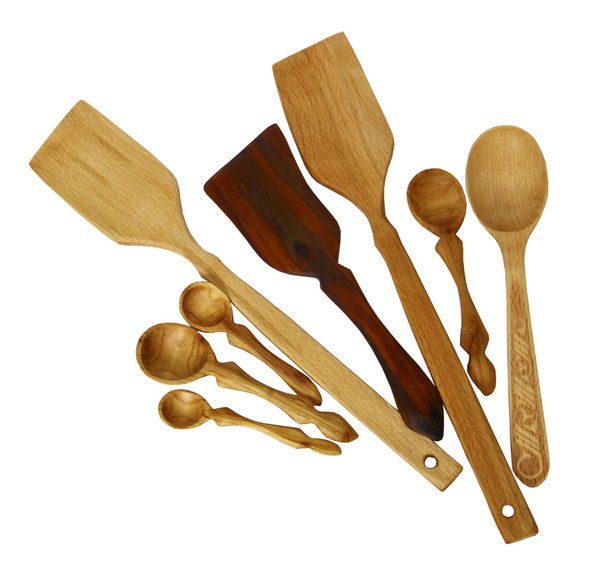 Palas y cucharas de madera sobre fondo blanco
 - Foto, Imagen