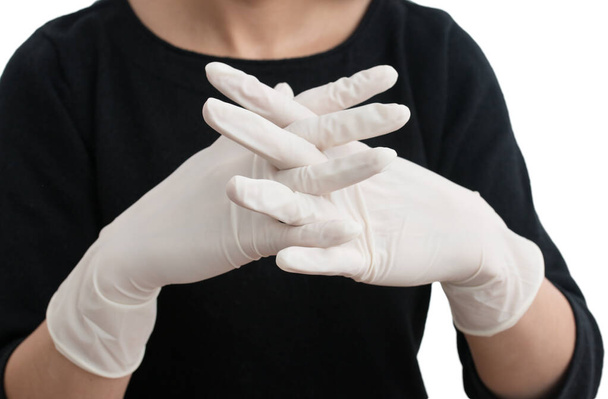 медичні білі рукавички на руках
 - Фото, зображення