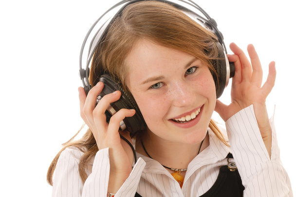 A cute girl listening music - 写真・画像