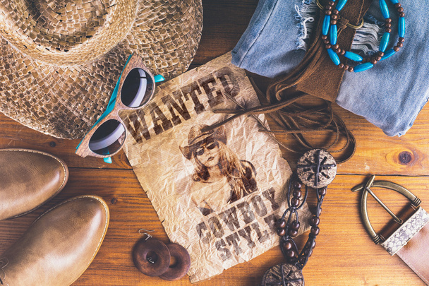 Accessories cowboy retro style on wooden surface with wanted pos - Фото, изображение