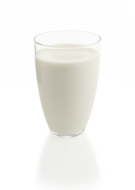 Glass of milk isolated on white background - Фото, изображение