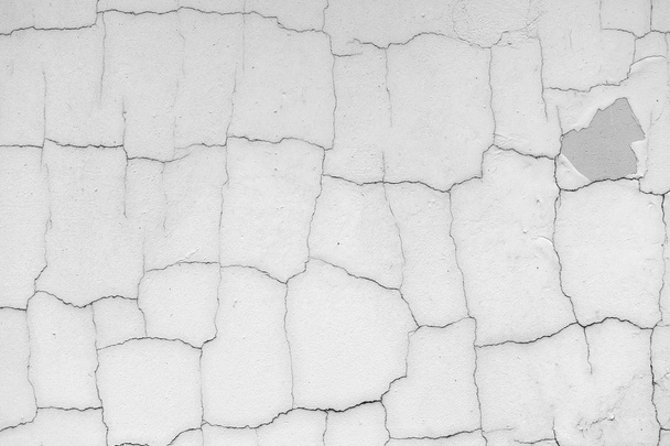Grey concrete wall with cracks - 写真・画像