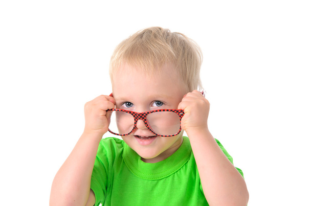 Cute boy with glasses in green shirt - Фото, зображення