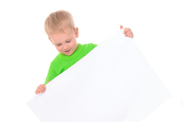 Little boy behind white banner - Foto, Imagen