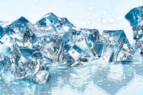 ice cubes on blue background - Foto, Imagem