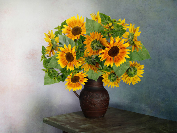 Still life with beautiful yellow sunflowers.A bouquet of flowers . - Foto, Imagem