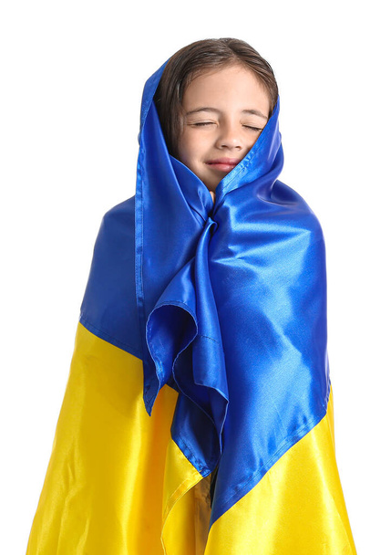 Little girl with Ukrainian flag on white background - Foto, afbeelding