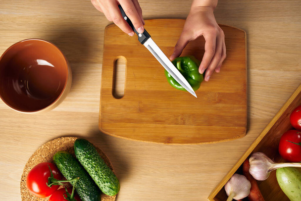 housewife Cooking healthy eating cutting board - Foto, Imagen
