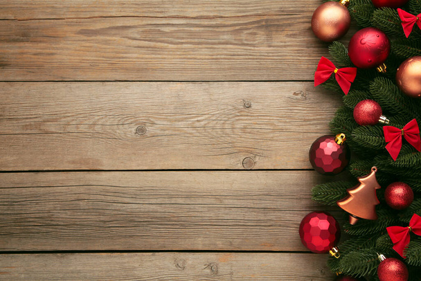 Christmas or New Year red decoration on grey background. Top view - Zdjęcie, obraz