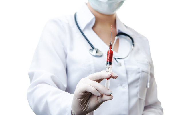 doctor with syringe blood - Foto, Imagen