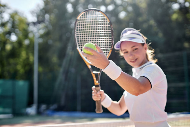 pretty female playing tennis game. Portrait of attractive female athletes with tennis racket - Φωτογραφία, εικόνα