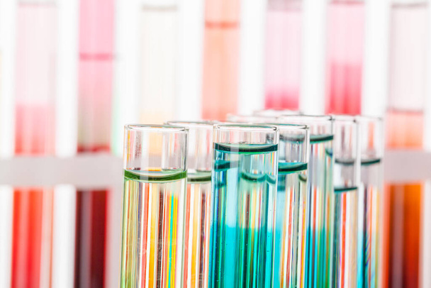 Still life in laboratory. Test tubes with colorful chemicals - Photo, image