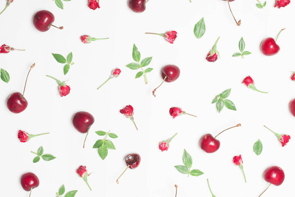 composition red flowers cherries green leaves. High quality beautiful photo concept - Photo, Image