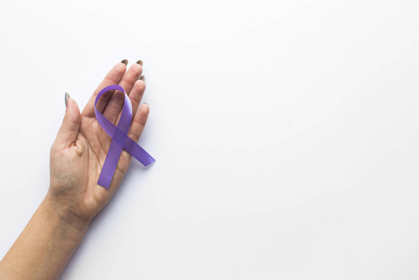 crop hand with lymphoma ribbon. High quality beautiful photo concept - Foto, Imagen