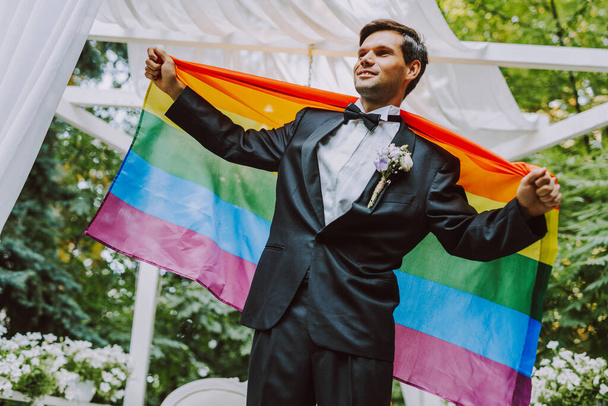 Homosexual couple celebrating their own wedding - LBGT couple at wedding ceremony, concepts about inclusiveness, LGBTQ community and social equity - Fotoğraf, Görsel