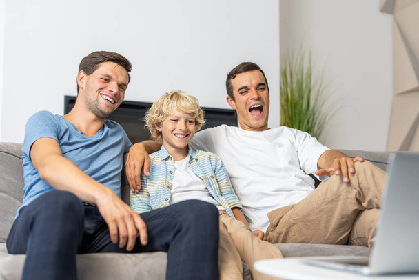 Lgbt family, gay couple with adopted son - Homosexual parents with their kid having fun at home - Fotoğraf, Görsel