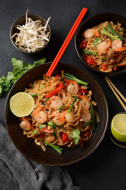 Thai Fried Noodles "Pad Thai" with shrimps and vegetables. Thai style noodles - Фото, изображение