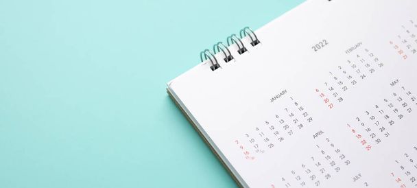 2022 calendar page on blue background business planning appointment meeting concept - Photo, Image