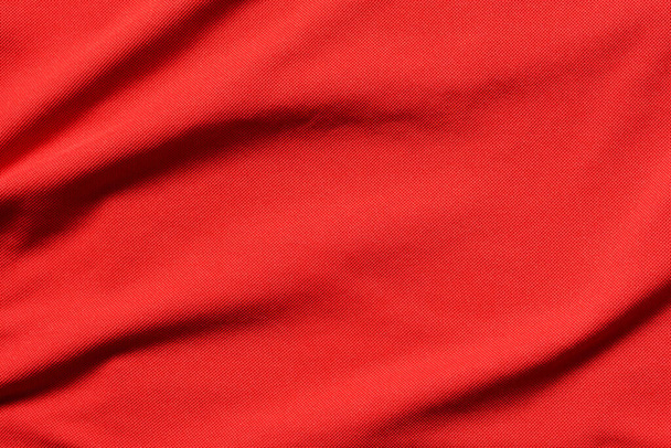 υφή των κενών κόκκινων ρούχων για φόντο. - Φωτογραφία, εικόνα