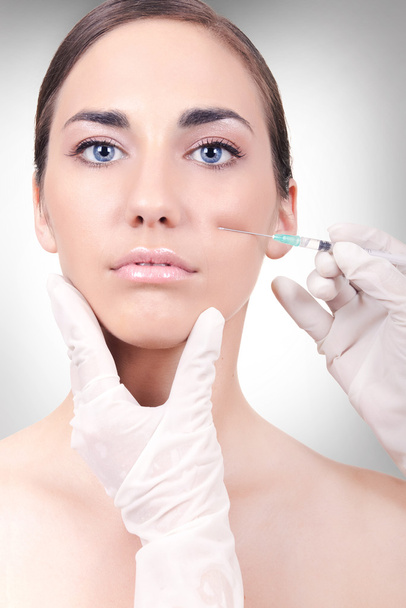 Woman having a collagen or botox injection - Foto, imagen