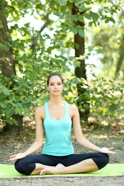 Woman doing yoga exercises - Zdjęcie, obraz