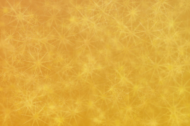 zlatý abstraktní rozostřené pozadí, hvězda tvar bokeh vzor. - Fotografie, Obrázek