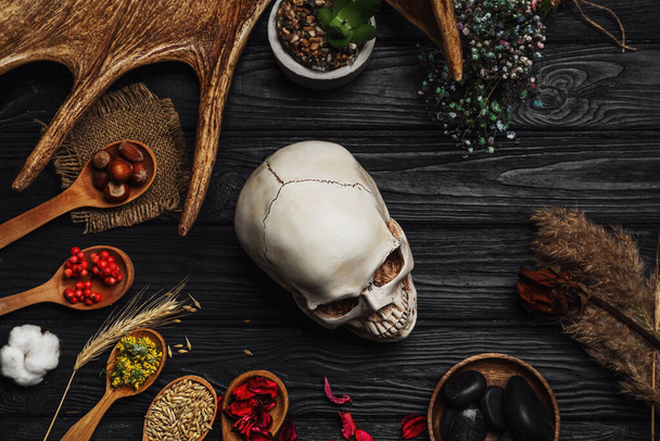 Ingredients for witch's ritual on wooden table - Фото, изображение
