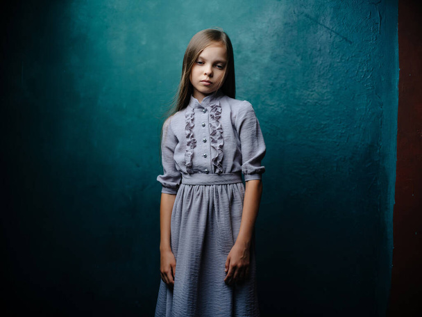 little girl in dress posing studio green background - Zdjęcie, obraz