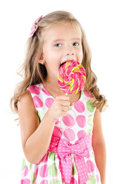 Happy little girl with lollipop isolated - Fotó, kép